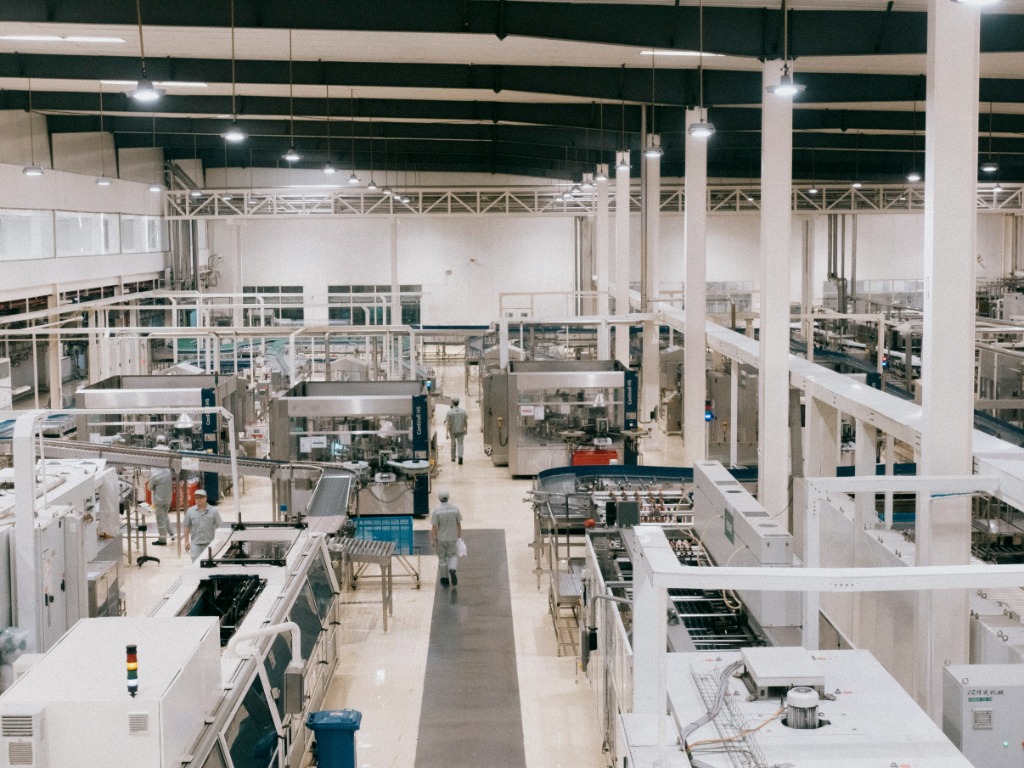 Indian manufacturing plant interior — bright shopfloor with machinery